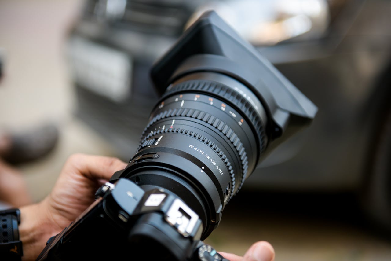 Close-up of a professional camera lens, captured with precision. Ideal for photography enthusiasts.